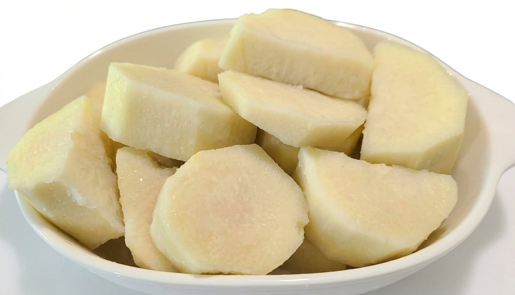 A bowl filled with peeled, cut Ghana Yam chunks.